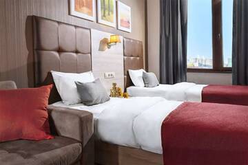 Фото номера Стандартный двухместный номер с 2 отдельными кроватями Отель Golden Tulip г. Краснодар 2