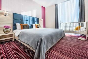 Фото номера Семейный делюкс  Отель Golden Tulip г. Краснодар 2