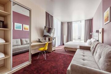 Фото номера Панорамный люкс Отель Golden Tulip г. Краснодар 2