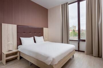 Фото номера Апартаменты делюкс Отель Golden Tulip г. Краснодар 7