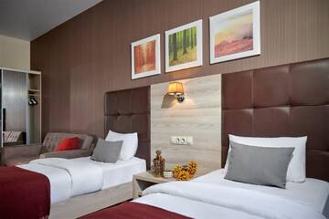 Фото номера Стандартный двухместный номер с 2 отдельными кроватями Отель Golden Tulip г. Краснодар 7