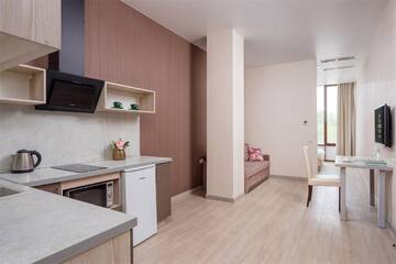 Фото номера Апартаменты делюкс Отель Golden Tulip г. Краснодар 2