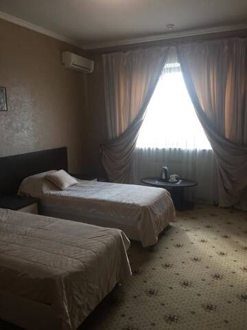 Фото номера Двухместный номер с 2 отдельными кроватями Гостиница БогАрт г. Краснодар 3