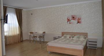 Фото номера Двухместный номер Делюкс с 1 кроватью Гостевой дом Guesthouse Taymirskaya 12 г. Краснодар 2
