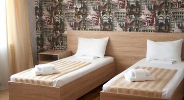 Фото номера Двухместный номер с 2 отдельными кроватями Гостиница Sun City г. Краснодар 3