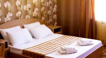 Фото номера Стандартный двухместный номер с 1 кроватью Гостиница Sun City г. Краснодар 2