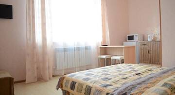 Фото номера Улучшенный семейный номер Гостиница Guest House Na Troitskoy г. Краснодар 2