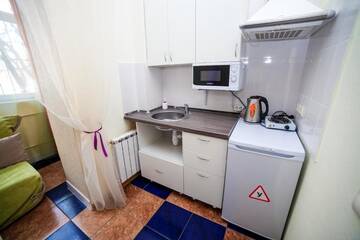 Фото номера Стандартный одноместный номер Апартаменты Рантье на улице Ким 141 г. Краснодар 4
