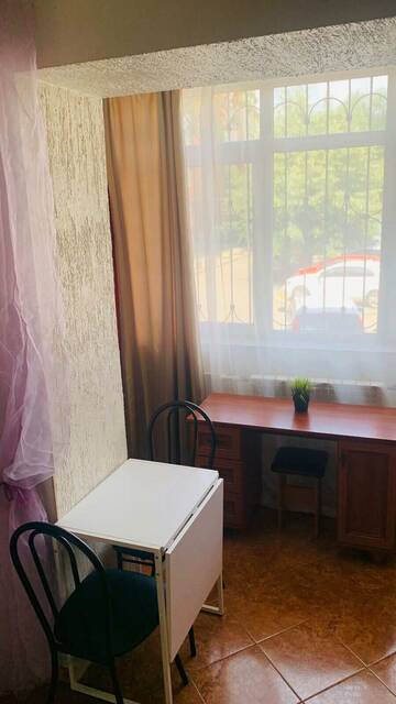 Фото номера Стандартный одноместный номер Апартаменты Рантье на улице Ким 141 г. Краснодар 11