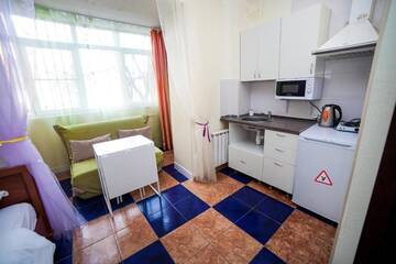 Фото номера Стандартный одноместный номер Апартаменты Рантье на улице Ким 141 г. Краснодар 3