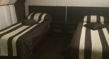 Фото номера Двухместный номер с 2 кроватями  Гостиница Guest House na Akademika Trubilina г. Краснодар 4