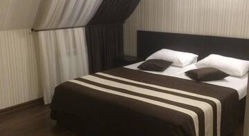 Фото номера Улучшенный двухместный  Гостиница Guest House na Akademika Trubilina г. Краснодар 3
