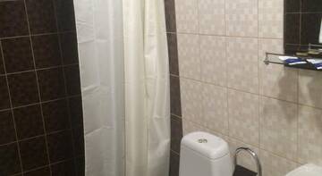 Фото номера Улучшенный двухместный  Гостиница Guest House na Akademika Trubilina г. Краснодар 2