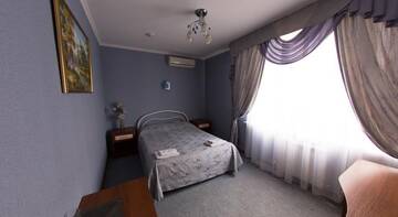 Фото номера Номер с 2 двуспальными кроватями &quot;queen-size&quot; (160х200см) Гостиница Гостевой Дом Ривьера г. Краснодар 4