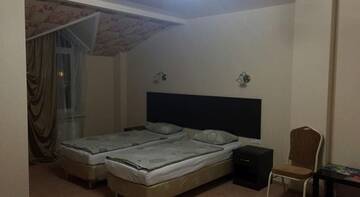 Фото номера Стандартный трехместный номер Гостиница Рай г. Краснодар 6
