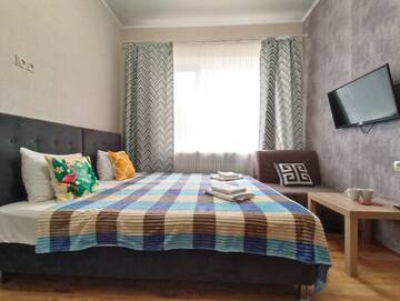 Фото номера #1 (Раздельные кровати+кресло) Гостевой дом Апарт-отель Home г. Краснодар 3