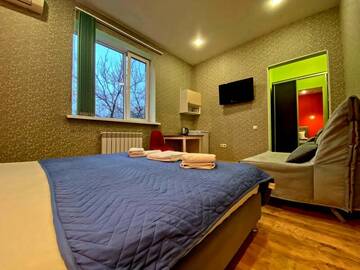 Фото номера #10 (Односпальные+диван) Гостевой дом Апарт-отель Home г. Краснодар 8