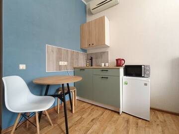 Фото номера #1 (Раздельные кровати+кресло) Гостевой дом Апарт-отель Home г. Краснодар 7
