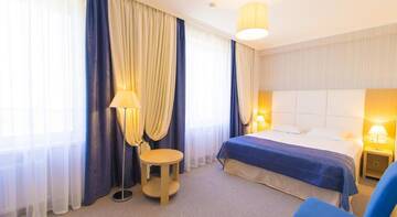 Фото номера АПАРТАМЕНТЫ С КУХНЕЙ И БАЛКОНОМ (40 М2) Апарт-отель Muller Bach г. Краснодар 7