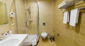 Фото номера АПАРТАМЕНТЫ С КУХНЕЙ И БАЛКОНОМ (40 М2) Апарт-отель Muller Bach г. Краснодар 4