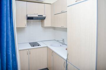 Фото номера СТАНДАРТНЫЕ АПАРТАМЕНТЫ С БАЛКОНОМ (42 М2) Апарт-отель Muller Bach г. Краснодар 3