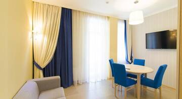 Фото номера АПАРТАМЕНТЫ С КУХНЕЙ И БАЛКОНОМ (40 М2) Апарт-отель Muller Bach г. Краснодар 5